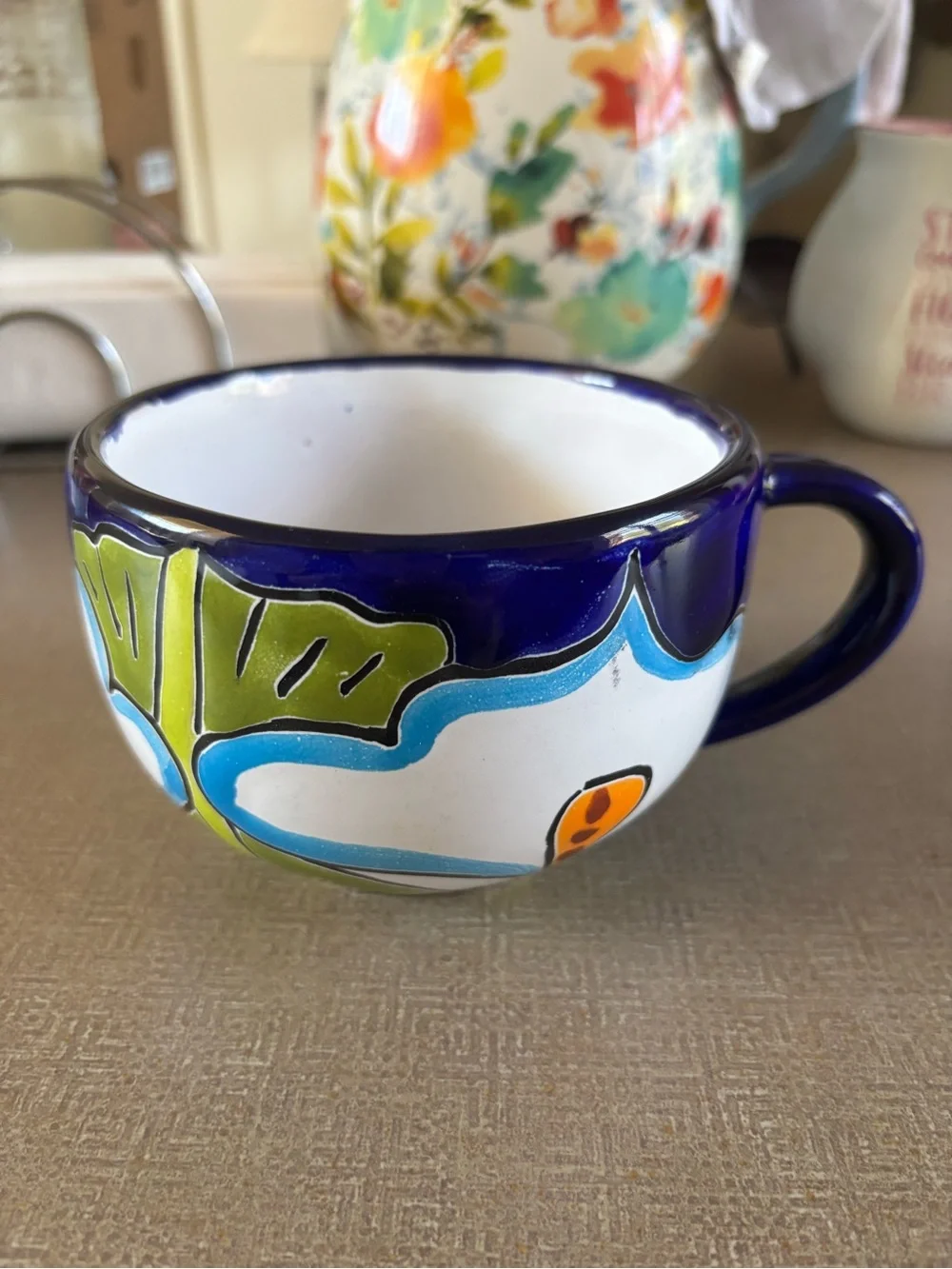 Hand-Painted Blue and White Floral Ceramic Cup